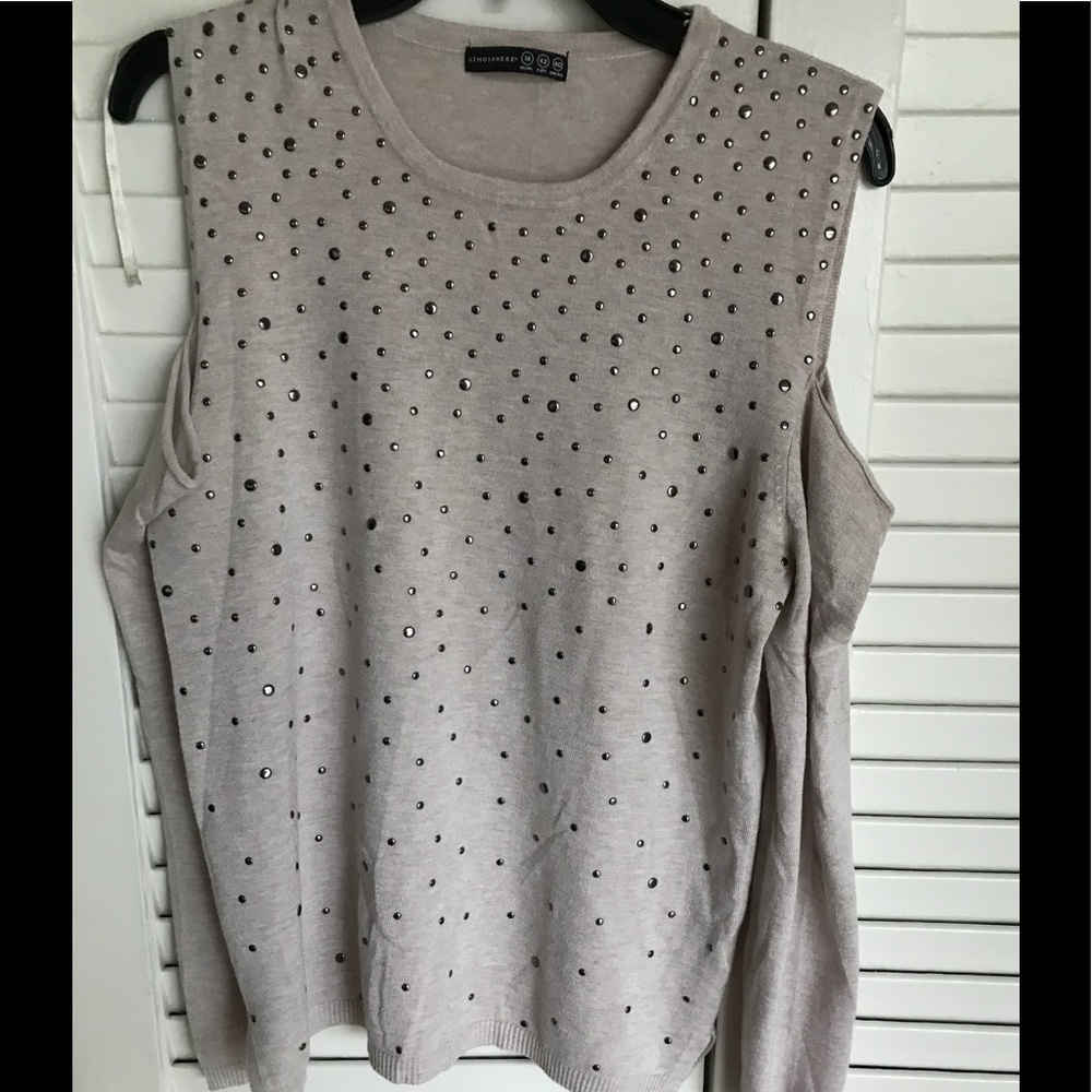 Cut out Sweater. New without tags.